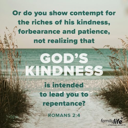 An excerpt of the daily verse over a trail through a sandy beach with dune grass