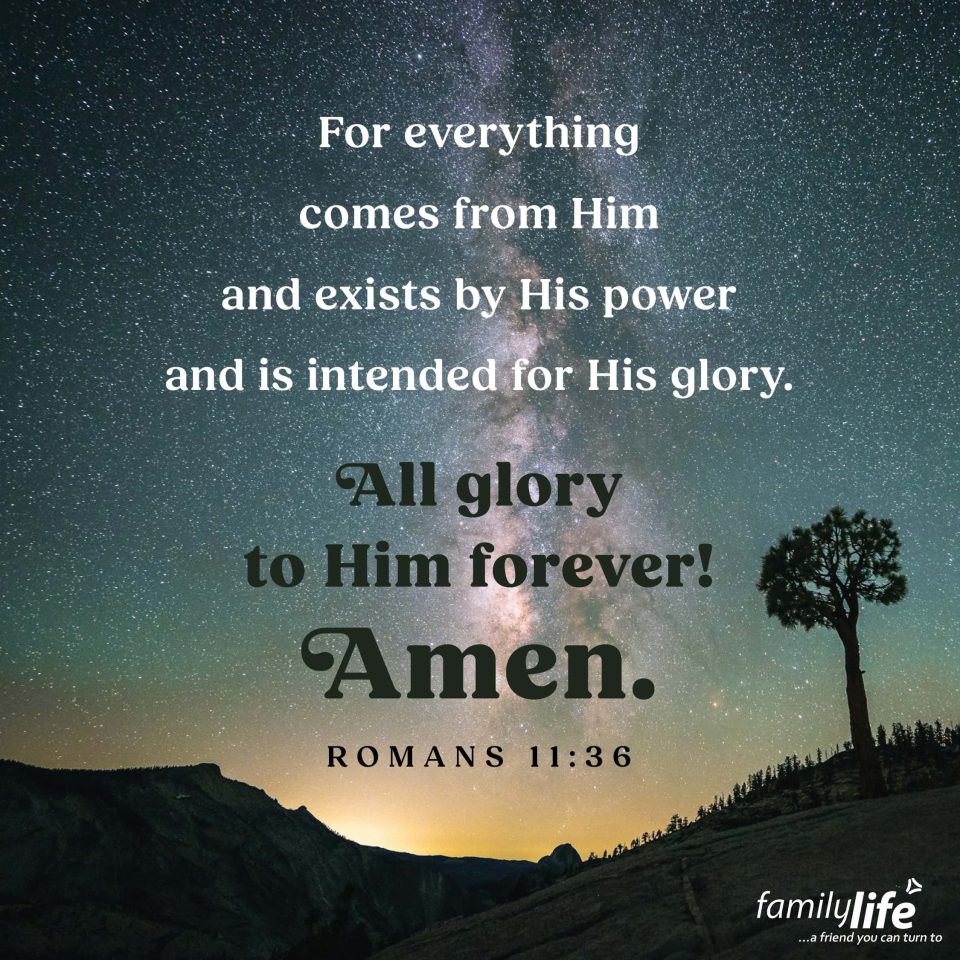 An excerpt of the daily verse over a long-exposer image of the night sky over some hills