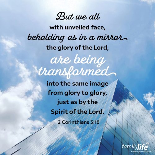 An excerpt of the daily verse with an upwards shot of a skyscraper on a sunny day in the background