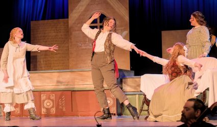 The March Sisters performing a dance number